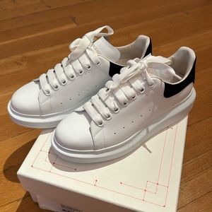 New in box Alexander McQueen sneakers. Size 39.5. White leather w/ black suede